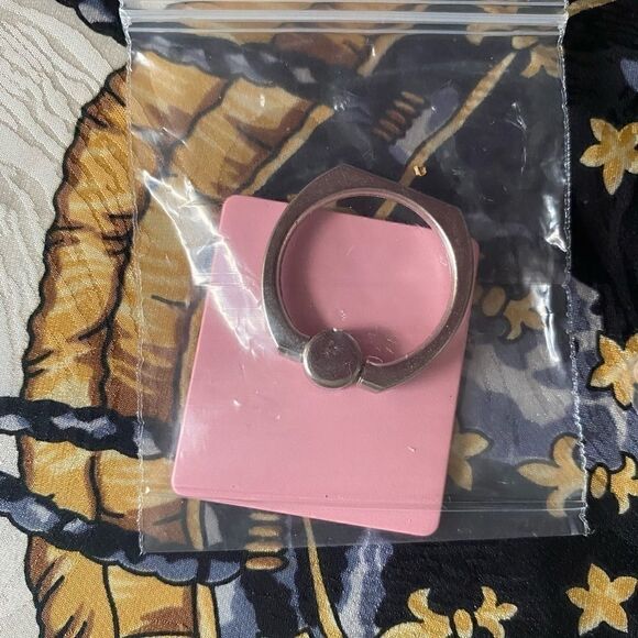 Cell phone rings & hooks bundle. Comes with several stick ons for hangers. - Picture 3 of 4